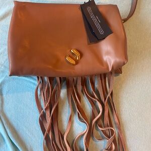 Brand New Tan clutch with fringes